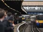 London southwestern railways: Passenger face delays and disruption London southwestern railways: commuters overlook disruptions and delays .