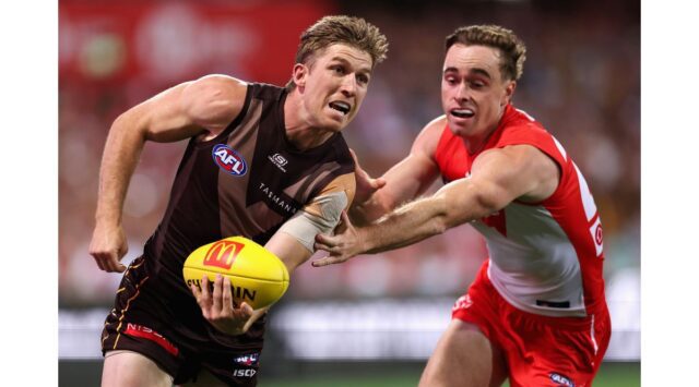 AFL Live: Thrilling Season Opener Between Swans and Hawks - Image 1 Recap of the thrilling AFL season opener between Sydney Swans and Hawthorn Hawks, highlighting key performances and injuries. Image courtesy (resources.afl.com.au)