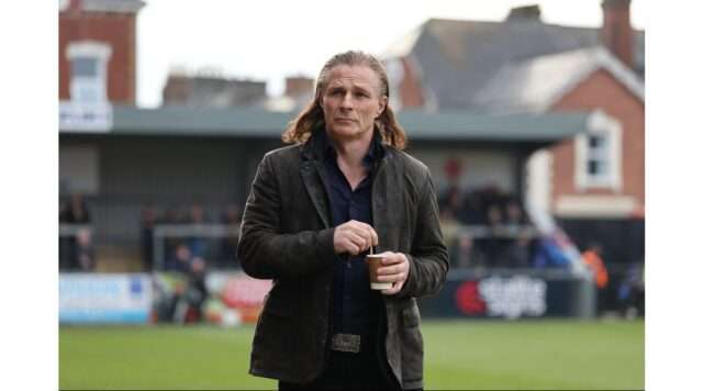 Gareth Ainsworth's Move: What It Means for Shrewsbury Town and Gillingham Gareth Ainsworth's move from Shrewsbury Town to Gillingham: implications for both clubs in their fight against relegation. Image courtesy (talksport.com)