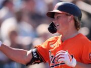 Explore Jackson Holliday's journey as he prepares for the 2025 MLB season with the Baltimore Orioles, showcasing his impressive Spring Training performance (img.mlbstatic.com).