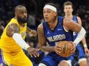 Lakers’ Slump Deepens in 2025: LeBron & Doncic Fall to Wagner’s Magic as Orlando Rises in Playoff Push Lakers lose to Magic, marking their third straight defeat; Orlando's Wagner shines in crucial victory. Image courtesy (bloximages.chicago2.vip.townnews.com)
