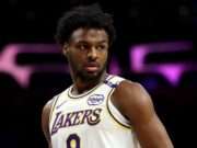 G League: Bronny James’ Rise Amid Expectations in Professional Basketball Explore Bronny James' journey in the G League, showcasing his performances, challenges, and growth as he follows in his father's footsteps (s.yimg.com).