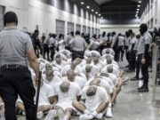 Explore the implications of the U.S. deportation of Tren de Aragua gang members to El Salvador and its impact on both nations. image courtesy (th-i.thgim.com)