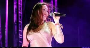 Noah Cyrus dazzles at Stagecoach 2025, showcasing her vocal talent and bold fashion choices in a memorable performance (www.usmagazine.com).