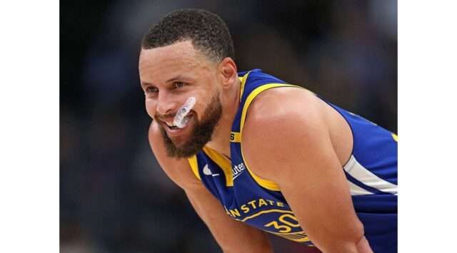 Stephen Curry: The Heartbeat of the Golden State Warriors An engaging look at Stephen Curry's role in the Golden State Warriors as the NBA season begins, focusing on his impact, leadership, and the team's prospects. Image courtesy (assets-cms.thescore.com)