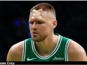 2025 NBA Playoffs: Kristaps Porziņģis Shows Grit in Celtics’ Win – Returns From Bloody Head Injury vs. Magic in Game 2 Explore Kristaps Porziņģis's resilience after his injury during playoff game against the Magic, showcasing his strength and determination. Image courtesy (jb-optimus.s3.ap-south-1.amazonaws.com)